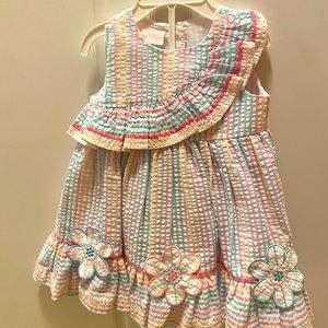 Baby girl rainbow seersucker dress with daisies